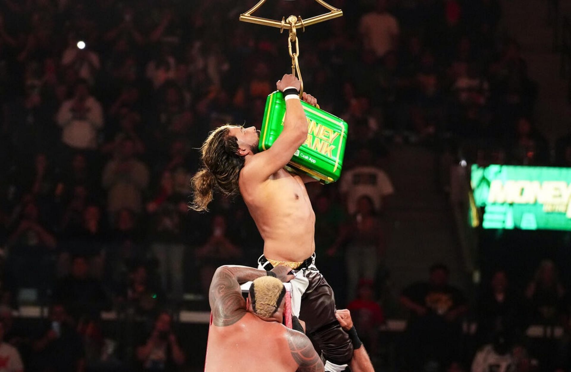 Several stars could compete for the case at SummerSlam if it is vacated. (Image Credit: WWE.com).